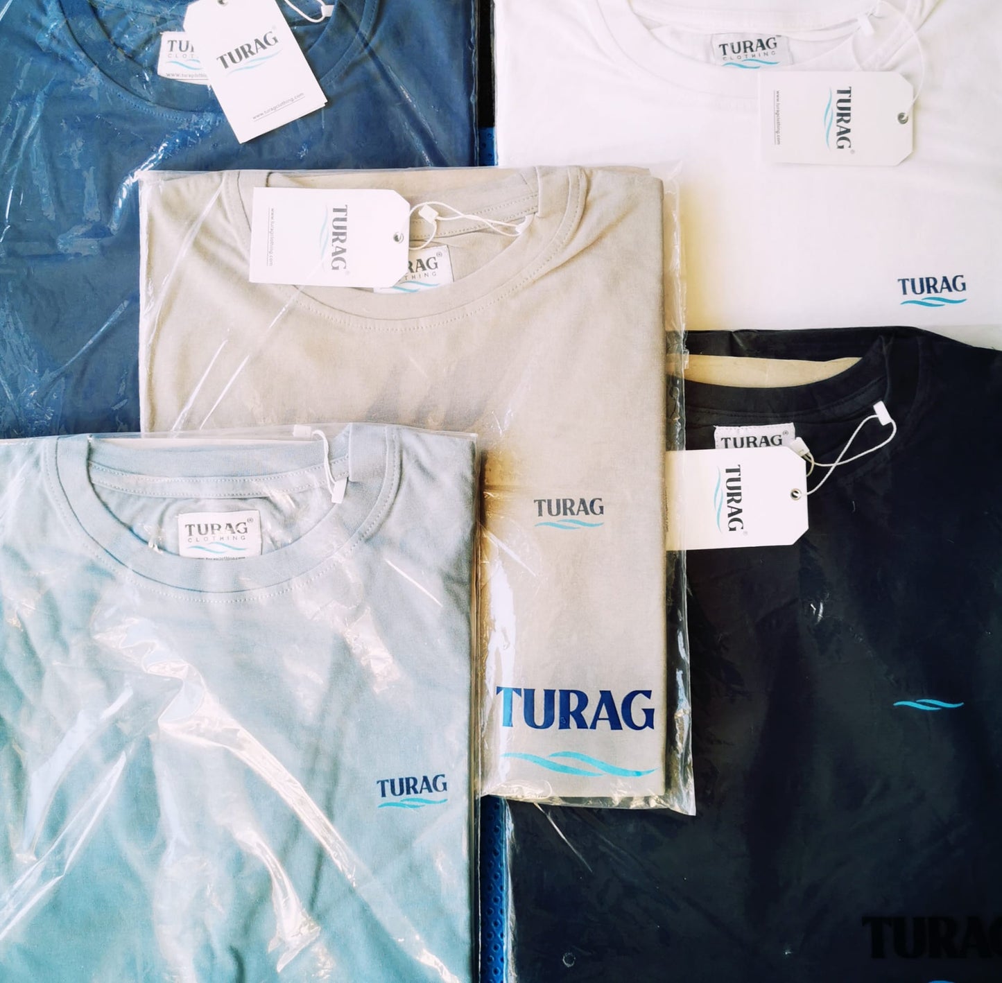 The Turag Essential 4-Pack T-Shirt Set: Versatile Style in Black, Navy, Grey, and Faded Denim